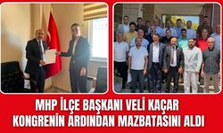 MHP Torbalı İlçe Başkanı Veli Kaçar mazbatasını aldı